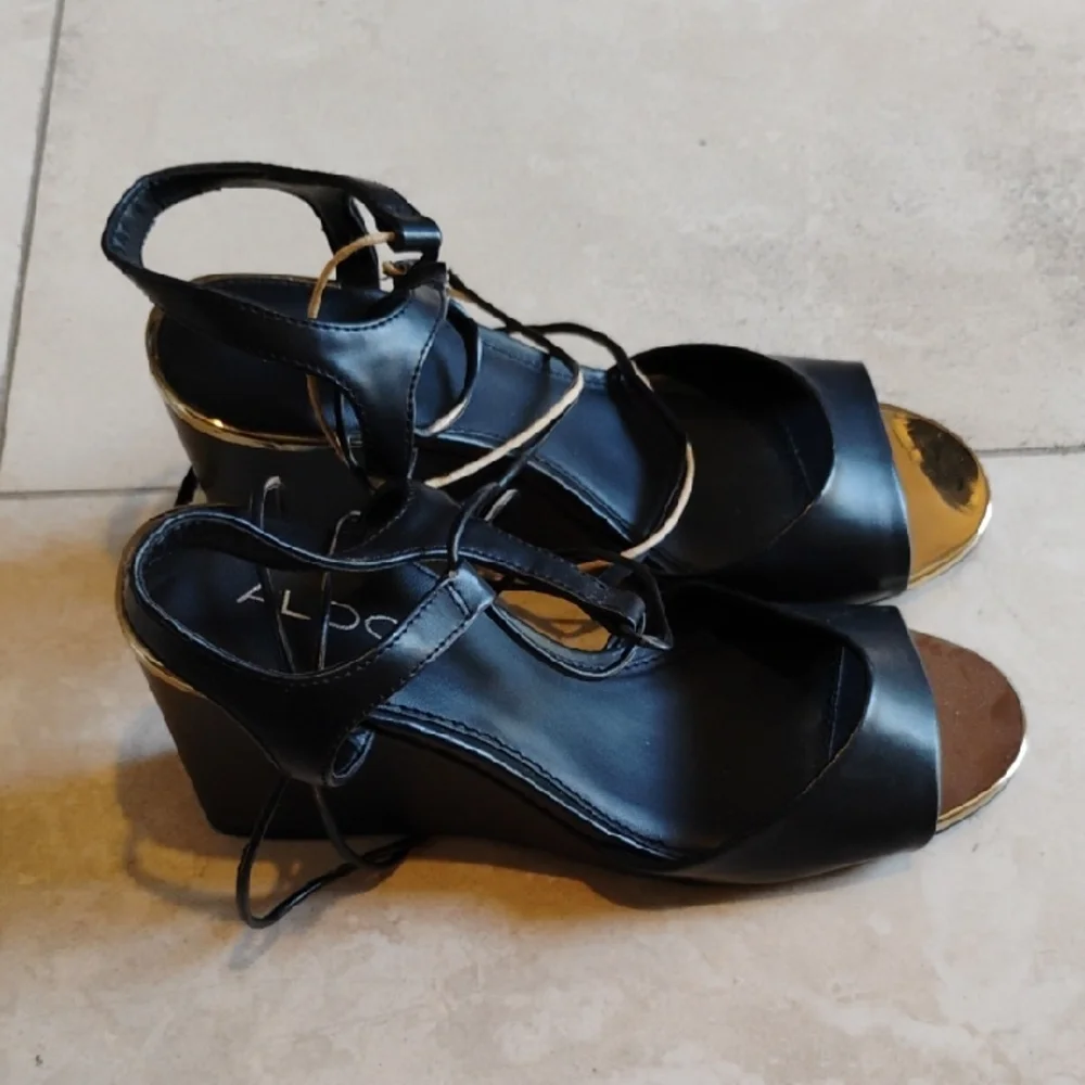 Aldo Black and Gold Strappy Wedges